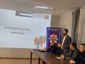 zdjęcia uczestników debaty